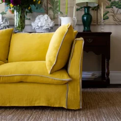 Coco 2.5 seater sofa with Contrast Welt Knife Edge cushion in Designers Guild Brera Lino Ochre - Hand Made in USA